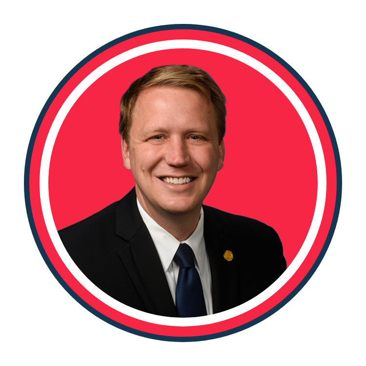 Aric Nesbitt, Senate Republican Leader of Michigan's headshot for RSLC. He is smiling.