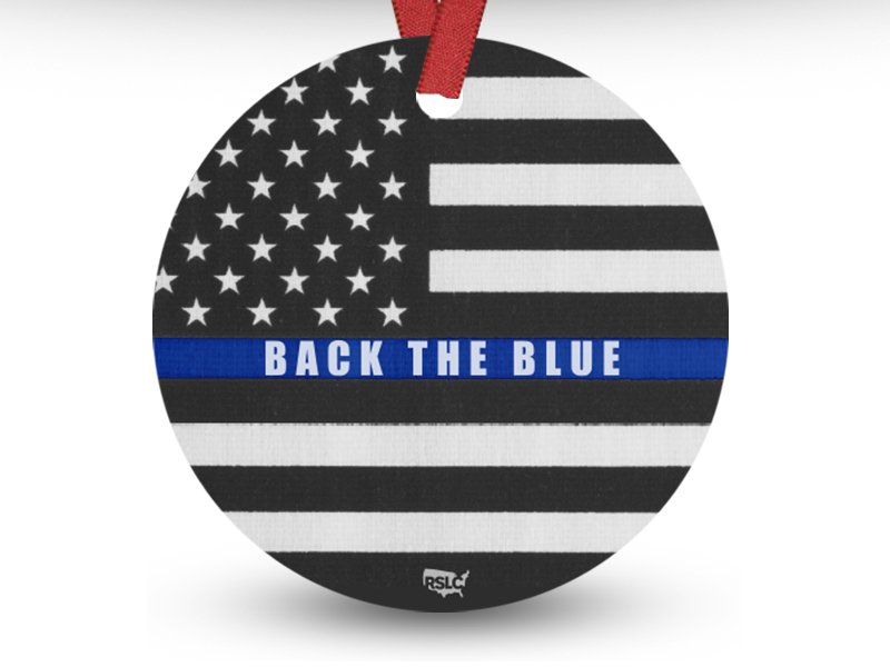 Round ornament featuring a black and white American flag with a thin blue line and the words 'Back the Blue' across the center and includes RSLC logo at the bottom.